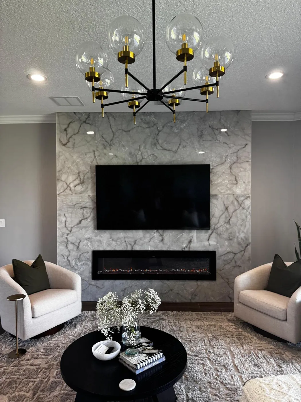 Interior painting with a Venetian plaster feature wall in a Lakewood Ranch living room