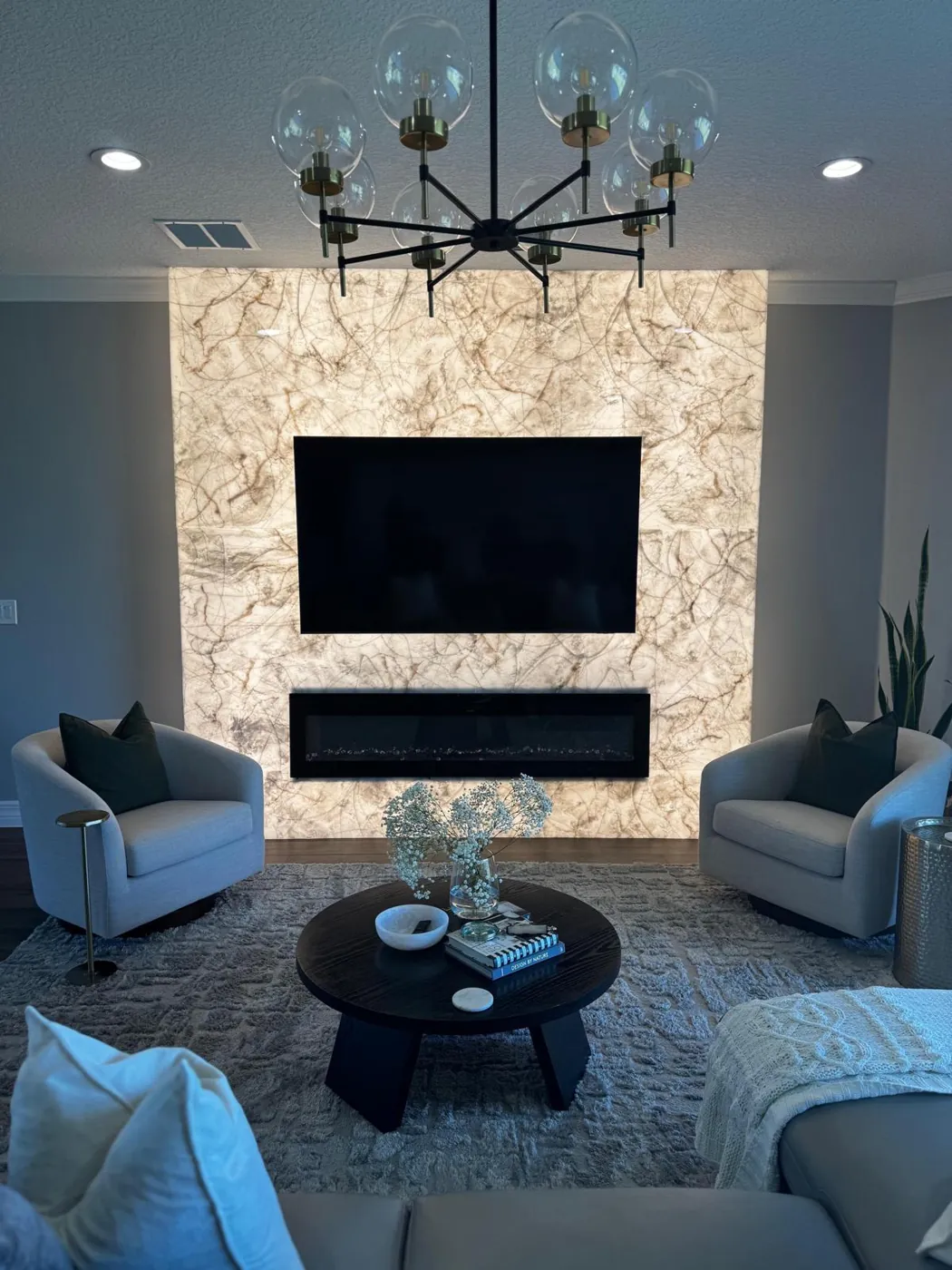 Interior painting of a Lakewood Ranch living room with stone fireplace